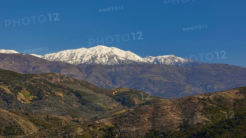 Snow-capped mountains with green valleys under a clear blue sky, Lefka Ori, White Mountains, mountain massif, West, Crete, Greece, Europe