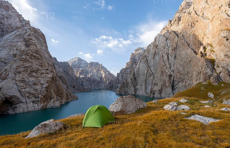 Wild camping, camping in the wilderness with a tent in front of mountain lake Kol Suu, Sary Beles Mountains, Naryn Province, Kyrgyzstan, Asia