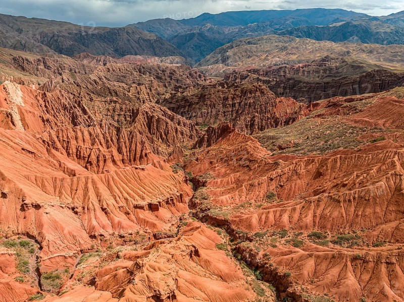 Eroded mountain landscape, canyon with red and orange rock formations, aerial view, Konorchek Canyon, Chuy, Kyrgyzstan, Asia