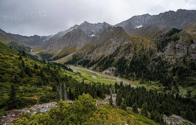 Green mountain valley with river and steep mountain peaks, Chong Kyzyl Suu Valley, Terskey Ala Too, Tien-Shan Mountains, Kyrgyzstan, Asia