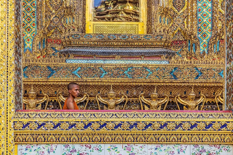 Wat Phra Kaeo temple, royal palace. Royal chapel with Buddhist monks and novices. Bangkok, Thailand, Asia