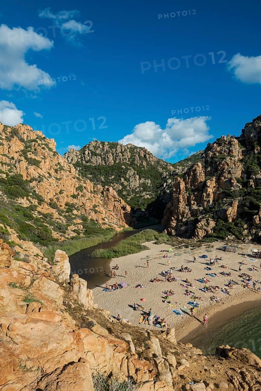 Red rocks and picturesque beach, Spiaggia di Cala li Cossi, Costa Paradiso, Sardinia, Italy, Europe