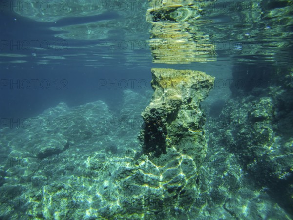 Clear underwater picture with rocks and water reflections in the sea, Lastovo, Neretva, Croatia, Europe