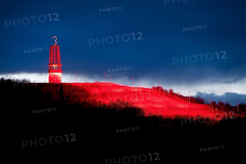 Artwork Illuminated at night with red illuminated slagheap Rheinpreussen by Otto Piene, Moers, Ruhr Area, North Rhine-Westphalia, Germany, Europe
