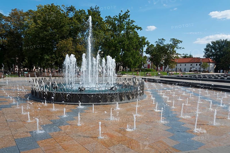 Large fountain with bubbling water in the centre of a park, Litewski Square, Lithuanian Square, Lublin, Poland, Europe