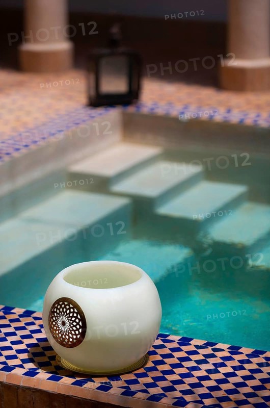 Oriental decoration in a riad, wellness, decorated, Arabic, oriental, Orient, tiles, lamp, tea light, bath, pool, water basin, Mediterranean, warm tones, warm colours, Morocco, Africa