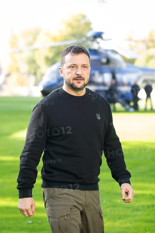 Volodymyr Zelensky (President of Ukraine) is received by Olaf Scholz (Chancellor of the Federal Republic of Germany) after his arrival by helicopter in front of the Federal Chancellery, 11 October 2024