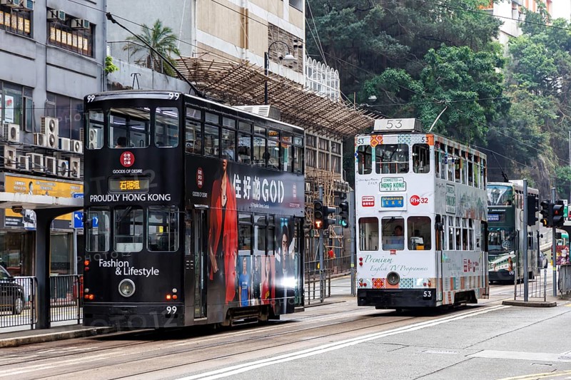 Hong Kong Tramway double-decker trams public transport at the Fortress Hill stop in Hong Kong, China, Asia