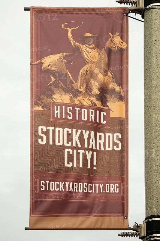 Oklahoma City, Oklahoma, A banner on a light pole in Stockyards City. The area has stores and restaurants for ranchers and others in the cattle business.. It is adjacent to the Oklahoma National Stockyards