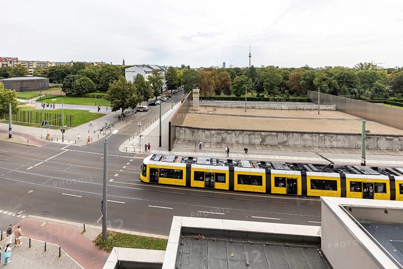 Berlin Wall Memorial, sight and reminder of the division by the Berlin Wall and of the fatalities at the border. Original preserved border strip with watchtower on Bernauer Strasse, Berlin, Germany, Europe