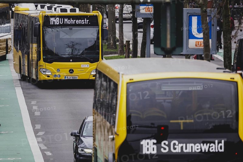 Two BVG buses travel along Schlossstraße in Berlin, 27 February 2024. Berliner Verkehrsbetriebe (BVG) have announced strikes for Thursday and Friday