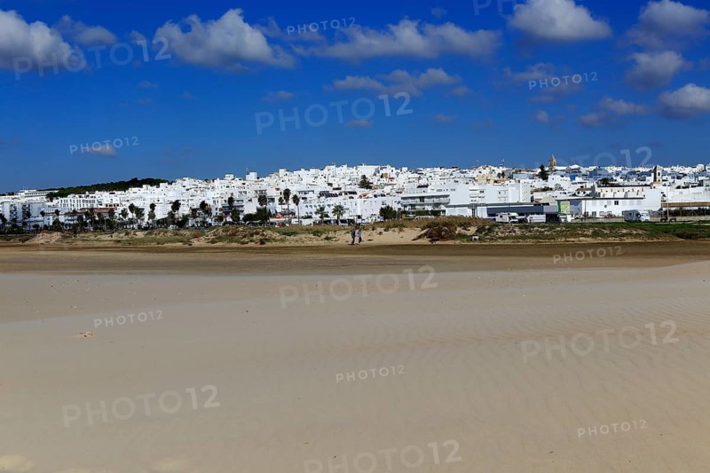Sandy beach and village of Conil de la Frontera, Cadiz Province, Spain, Europe