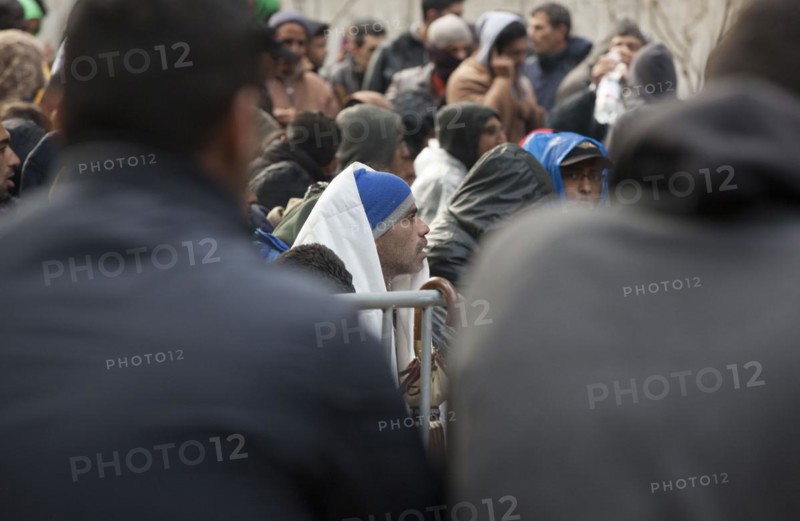 Refugees from Syria waiting to be registered at the Central Reception Centre for Asylum Seekers at the Berlin State Office for Health and Social Affairs, 09.10.2015