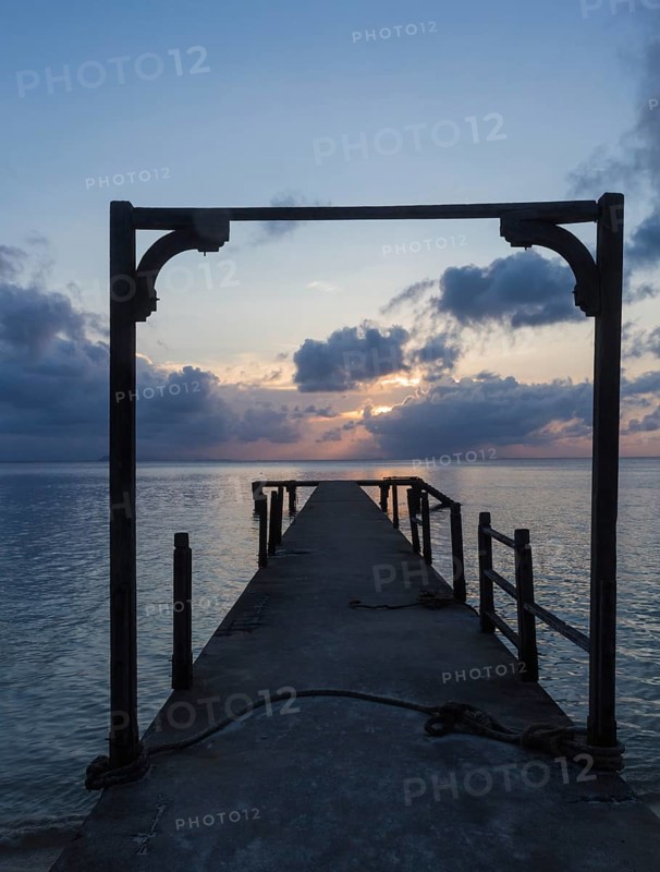 Wooden arch on an abandoned pier. Malaysia/