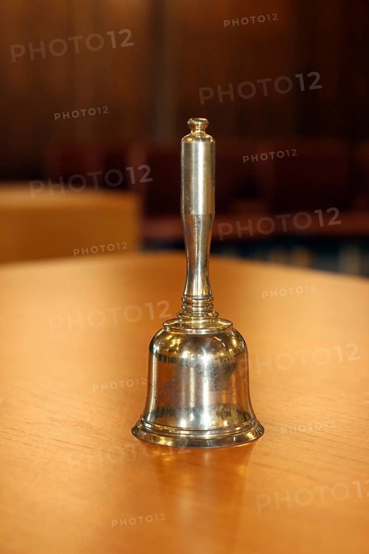 Close-up of a hand bell used, for example, in meetings, committees or courtrooms (here: council chamber of the municipality of Mutterstadt, Rhineland-Palatinate)