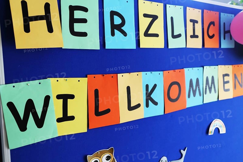 Symbolic image for the start of the new school year: notice board in a school with the inscription Welcome