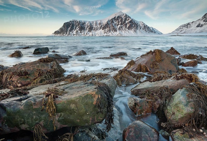 Long exposure, winter evening mood at Skagsanden, stones on the beach at Flakstad, Flakstadøy, Lofoten, Nordland, Norway, Europe