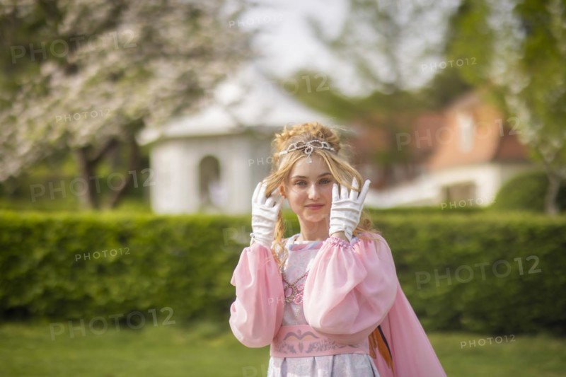 Cinderella can also be seen around Moritzburg Castle in spring. Model Tamara Kretschmer once again slipped into the coveted role of the legendary Cinderella with the ball gown, Moritzburg, Saxony, Germany, Europe