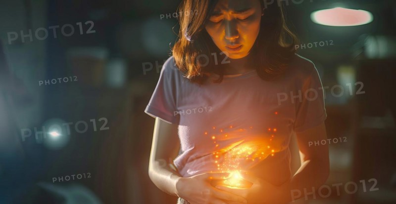 A woman is holding her stomach, stomach pain during menstruation or constipation or other illness, AI generated