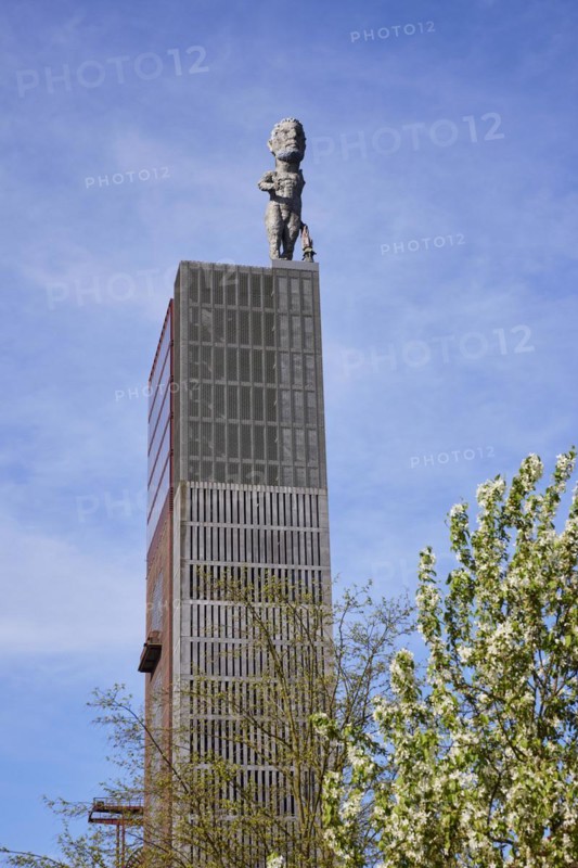 Statue of Hercules on the winding tower of Nordstern colliery against a blue sky in Nordsternpark, Gelsenkirchen, Ruhr area, independent city, North Rhine-Westphalia, Germany, Europe