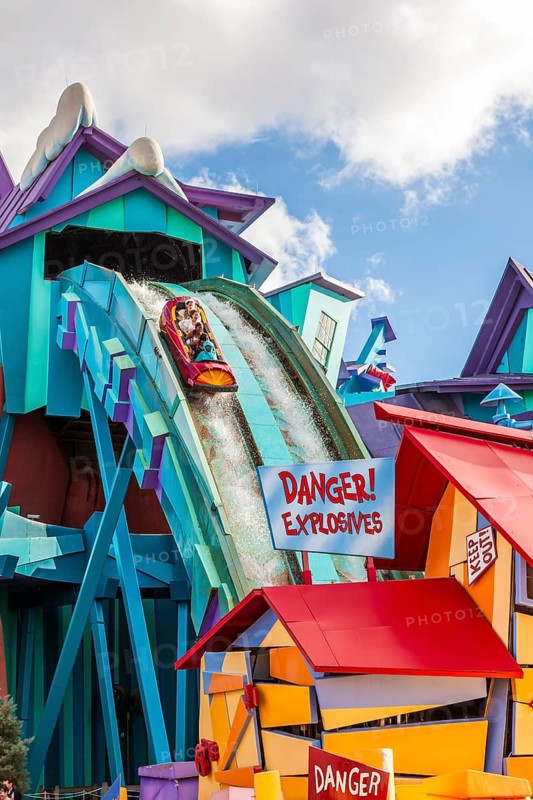 Park guests riding Dudley Do-Right's Ripsaw Falls at Universal Studios Islands of Adventure in Orlando, Florida, USA, North America