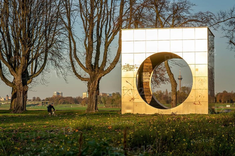 Rheinpark Neuss, cube structure as a recreation area, built as part of Euroga 2002plus, view of the Rhine Tower in Düsseldorf, North Rhine-Westphalia, Germany, Europe