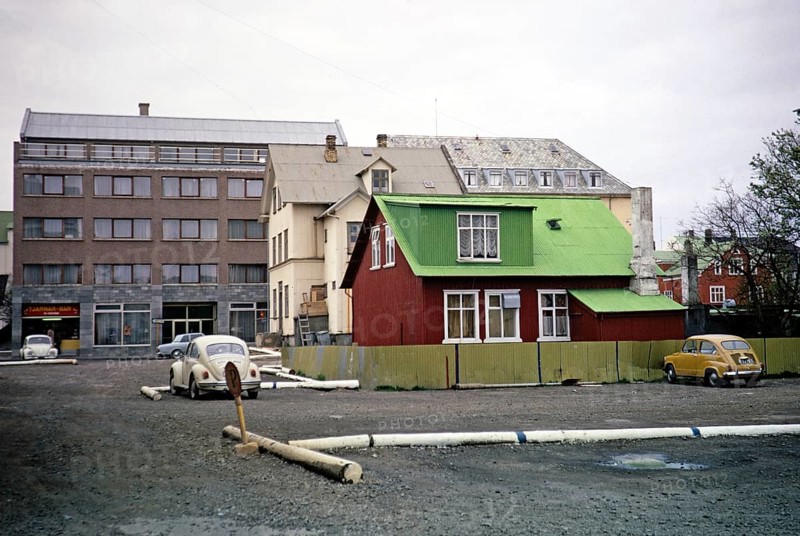 Contrast between historic buildings made of corrugated iron and modern buildings, Reykjavík, Iceland 1972