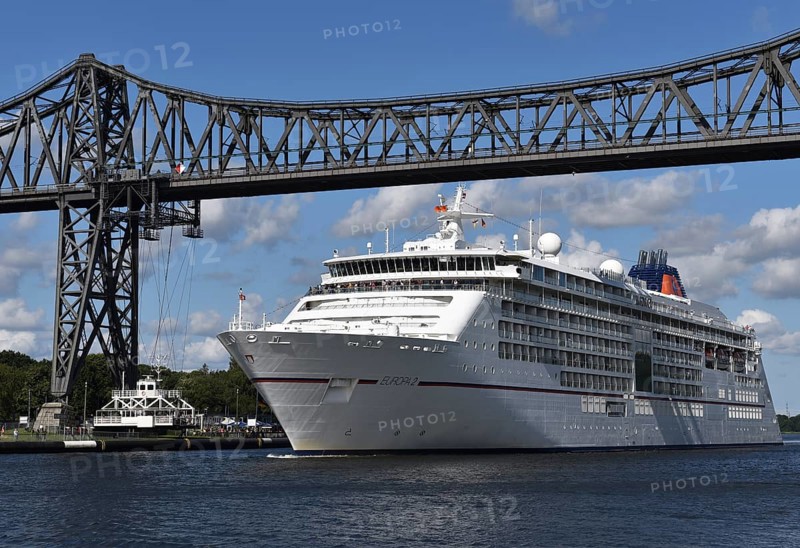 Cruise ship Europa 2 passes through the railway bridge in the Kiel Canal in Rendsburg, Kiel Canal, Schleswig-Holstein, Germany, Europe