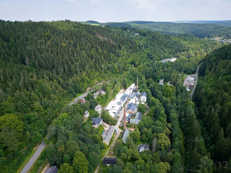 Schindler's blue colour factory is located directly on the Zwickauer Mulde river and belongs to the Zschorlau district of Albernau in the Saxon Ore Mountains. Since 2019, it has been part of the Schneeberg Mining Landscape and a UNESCO World Heritage Site in the Erzgebirge/Krušnohorí Mining Region. On 27 February 1649, the Schneeberg merchant Erasmus Schindler bought a plot of land to build a blue paint factory on the Zwickauer Mulde near Albernau. On 4 May 1649, he received the privilege to build a blue dye mill from Elector Johann Georg I. As Schindlerswerk GmbH & Co. KG, it is probably the world's oldest paint factory still in production. It is associated with a long tradition of producing blue cobalt pigments and the commercial manufacture of colour pigments. In more recent times, production has been expanded to include various paints. The company also produces laundry blue, Schindlerswerk, Zschorlau OT Albernau, Saxony, Germany, Europe