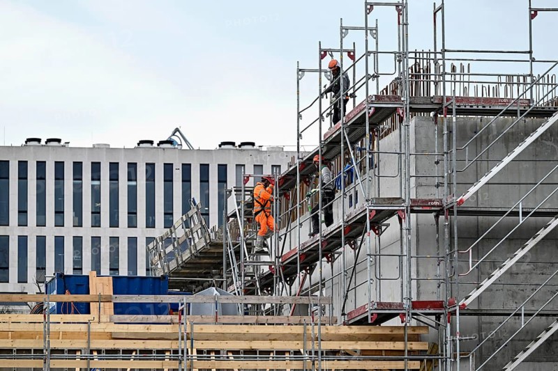 Building site scaffolding construction worker