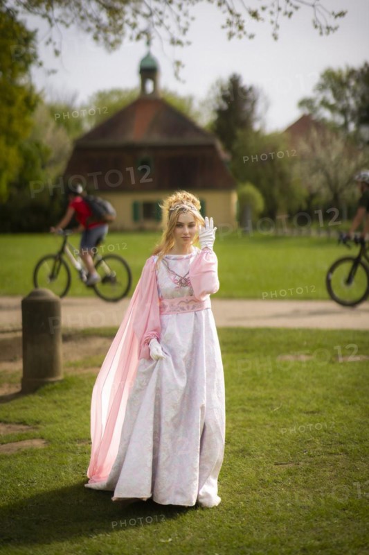Cinderella can also be seen around Moritzburg Castle in spring. Model Tamara Kretschmer once again slipped into the coveted role of the legendary Cinderella with the ball gown, Moritzburg, Saxony, Germany, Europe