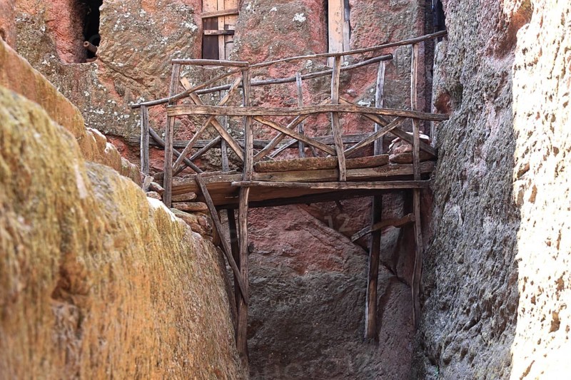 Rock churches of Lalibela, path between the rock churches, wooden bridge, wooden footbridge, Ethiopia, Africa