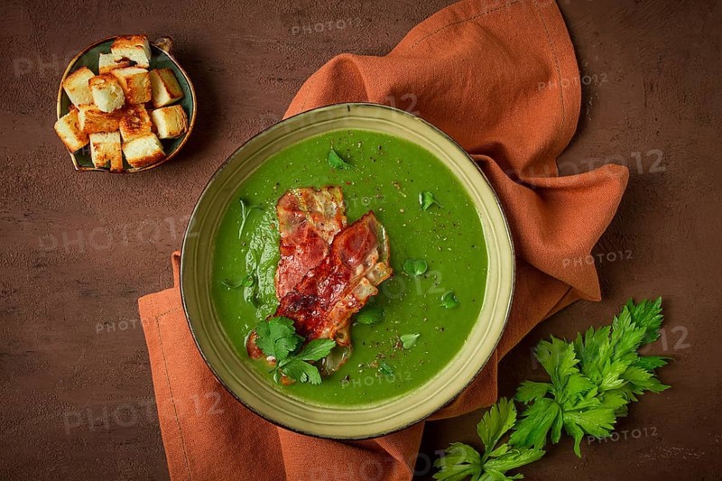 Green mashed soup, with bacon and croutons, homemade, no people