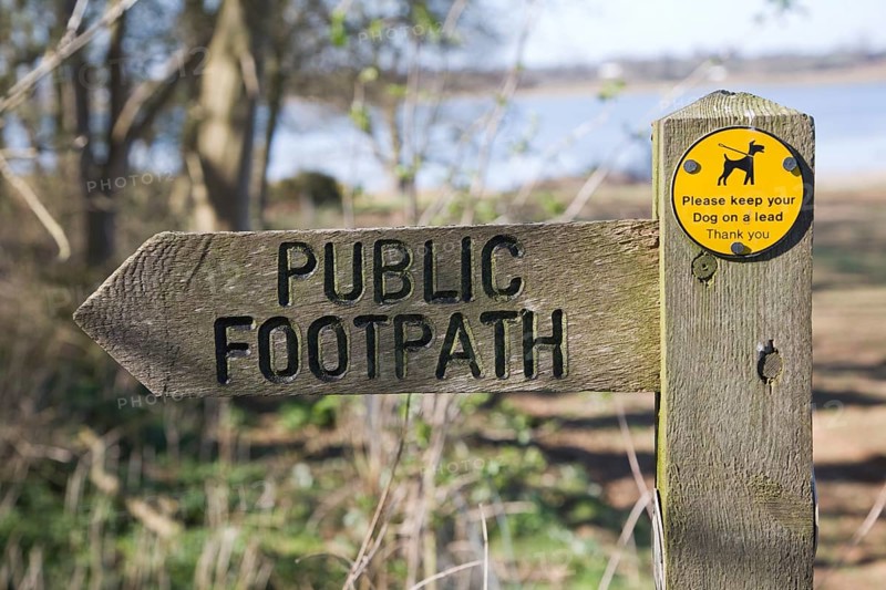 Arrow direction pointer on wooden public footpath sign, Sutton, Suffolk, England, United Kingdom, Europe