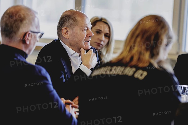 Olaf Scholz (SPD), Federal Chancellor, at a meeting with migrants and people involved in the field at SV Babelsberg in Potsdam, 26 February 2024