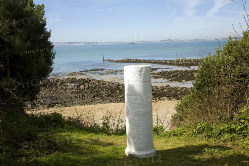 White marker post by sandy beach, Island of Herm, Channel Islands, Great Britain