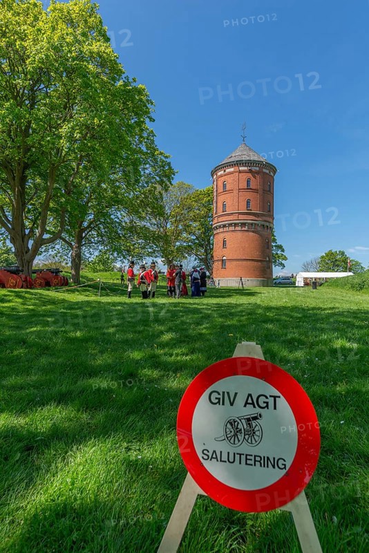 Nyborg Castle, medieval fortress with moat and ramparts, brick building, festival with soldiers in historical uniform, historical cannons, round tower from the 17th century, warning sign Attention salute shots, Fyn, island of Funen, Denmark, Fy, Funen, Denmark, Europe