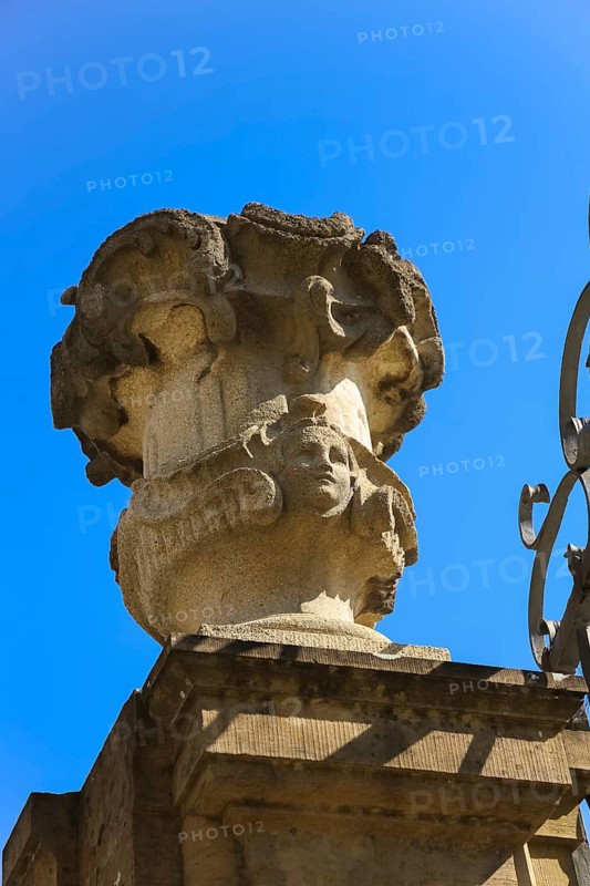 Stadion Castle Bönnigheim, detail, wall end, decorative element on wall, fence, vase-like stone sculpture, relief, face, building, architecture, historical building, late Baroque style, master builder Anton Haaf, built in 1756 by order of Imperial Count Anton Heinrich Friedrich von Stadion, Minister and Chancellor of the Archbishop and Elector of Mainz, country castle, summer residence, window, white shutters, roof, Bönnigheim, Ludwigsburg district, Baden-Württemberg, Germany, Europe