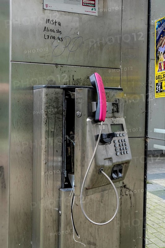 Vandalism, destroyed public telephone box, Telekom in Gelsenkirchen, North Rhine-Westphalia, Germany, Europe