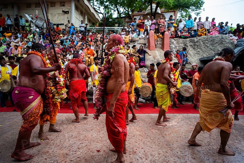GUWAHATI, INDIA, AUGUST 19: Priests dance in the beat of Dhol (Drum) during the annual three-day-long Deodhani festival at the Kamakhya Temple on August 19, 2024 in Guwahati, India. The Deodhani festival is dedicated to Serpent Goddess Kamakhya, people believed that Goddess Kamakhya fulfills the wishes of the devotees who participate in this festival