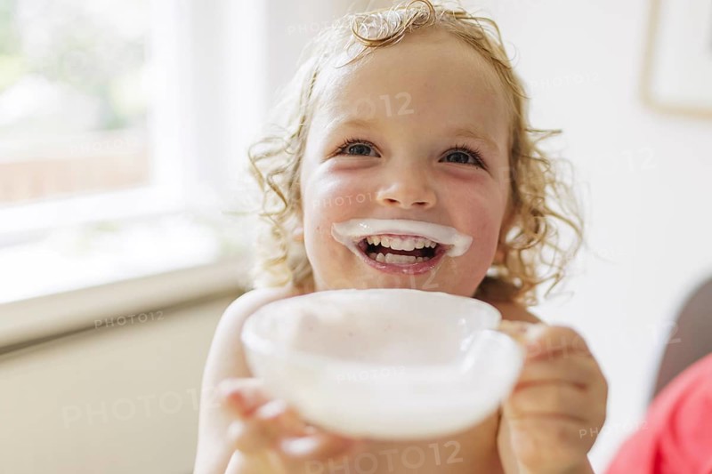 Toddler with a milk moustache, Bonn, 10.07.2024