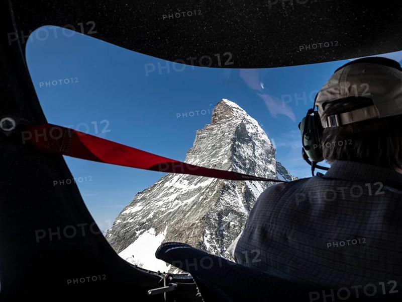 Flight in small aircraft in the swiss alps, view towards peak of Matterhorn, Switzerland, Europe