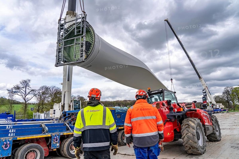 Preparation for the transport of a 68 metre long blade, a wind turbine, with a self-propelled Blade-Lifter vehicle, over a 40 km long route in the Bergisches Land, through towns, villages, over country roads, narrow through roads, to the construction site of the wind turbine near Hagen, North Rhine-Westphalia, Germany, Europe