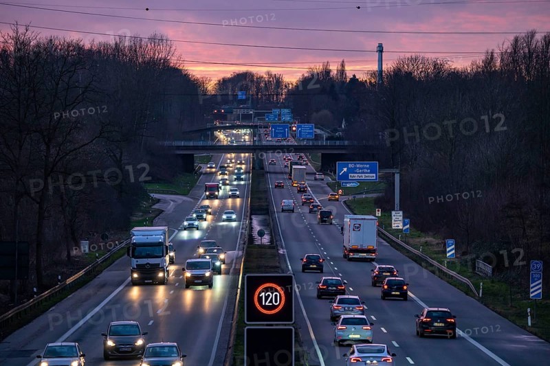 Motorway A40, Ruhrschnellweg, near Bochum, dense evening traffic, in front of the motorway junction Bochum, A43, view in west direction, North Rhine-Westphalia, Germany, Europe