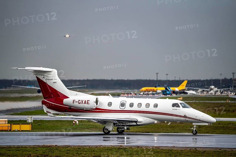 Private jet, Embraer Phenom 300 F-GXAE, on the western runway, Frankfurt am Main Airport, FRA, Hesse, Germany, Europe