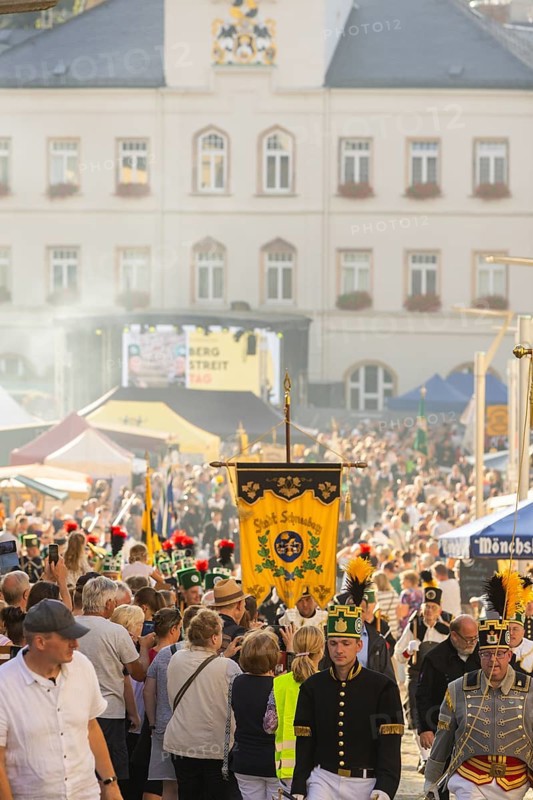 The so-called Bergstreittag is a beautiful centuries-old tradition and is celebrated on 22 July, the church memorial day and former feast day of Mary Magdalene in Schneeberg. The four quarterly sermons introduced in 1649 remained in place until 1845. These sermons were then abolished in favour of a single day, 22 July, which fell on Mary Magdalene. The Freiberg Mining Office recommended that this day should be celebrated with a festival and a mountain parade. In 1846, the Royal Ministry of Finance issued a decree to celebrate St Mary Magdalene's Day with a sermon and a magnificent mountain procession. The last major procession took place in July 1913. The First World War put an end to these processions. The tradition was not revived until July 1933, 528th Bergstreittag, mountain parade, Schneeberg, Saxony, Germany, Europe