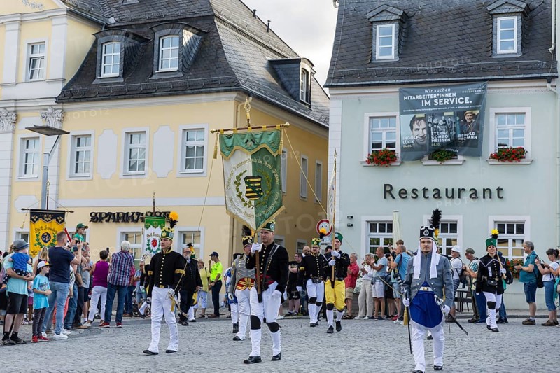 The so-called Bergstreittag is a beautiful centuries-old tradition and is celebrated on 22 July, the church memorial day and former feast day of Mary Magdalene in Schneeberg. The four quarterly sermons introduced in 1649 remained in place until 1845. These sermons were then abolished in favour of a single day, 22 July, which fell on Mary Magdalene. The Freiberg Mining Office recommended that this day should be celebrated with a festival and a mountain parade. In 1846, the Royal Ministry of Finance issued a decree to celebrate St Mary Magdalene's Day with a sermon and a magnificent mountain procession. The last major procession took place in July 1913. The First World War put an end to these processions. The tradition was not revived until July 1933, 528th Bergstreittag, mountain parade, Schneeberg, Saxony, Germany, Europe