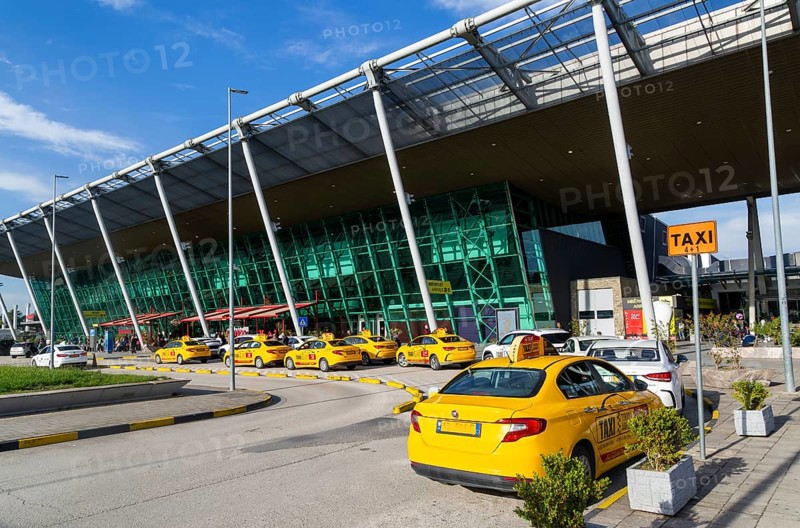 Taxis outside terminal building Tirana International Airport Nënë Tereza, Mother Theresa Rinas Airport, Tirana, Albania, Europe
