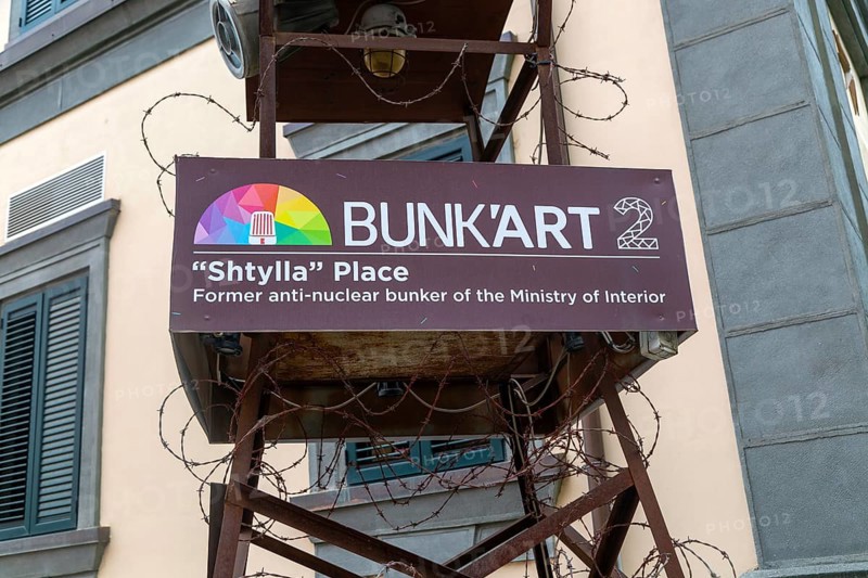 Sign for Bunk'art 2 former anti-nuclear bunker in city centre of Shtylla Place, Tirana, Albania, Europe