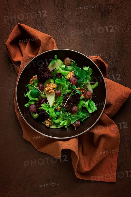 Fresh salad, waldorf, celery stalk, with apple and walnut, grapes, herbs, homemade, no people